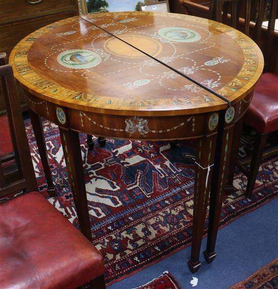 A pair of modern Sheraton style demi lune side tables W.115cm